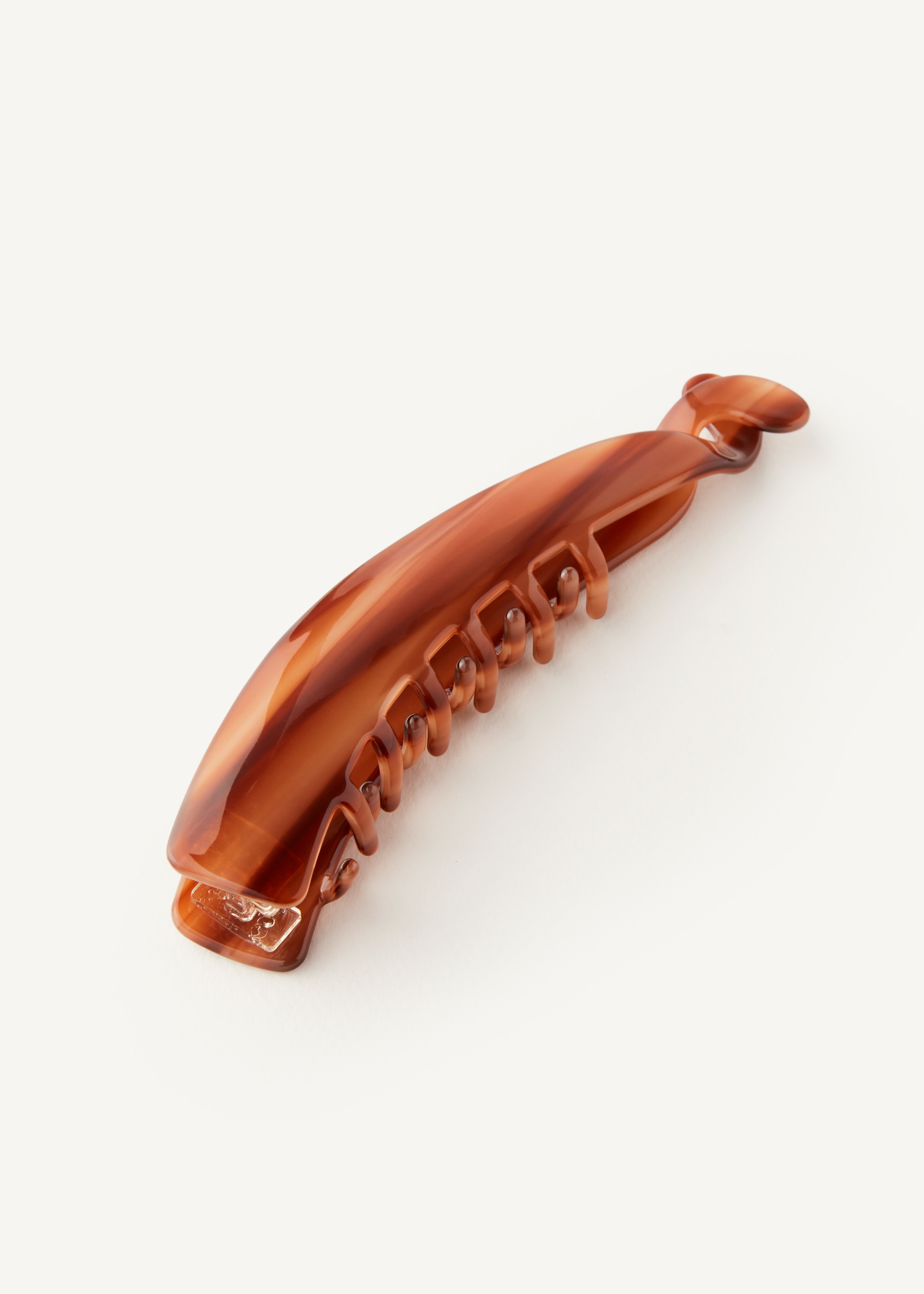 Banana Clip in Honey on a white background