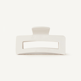 White hair clip on a white background