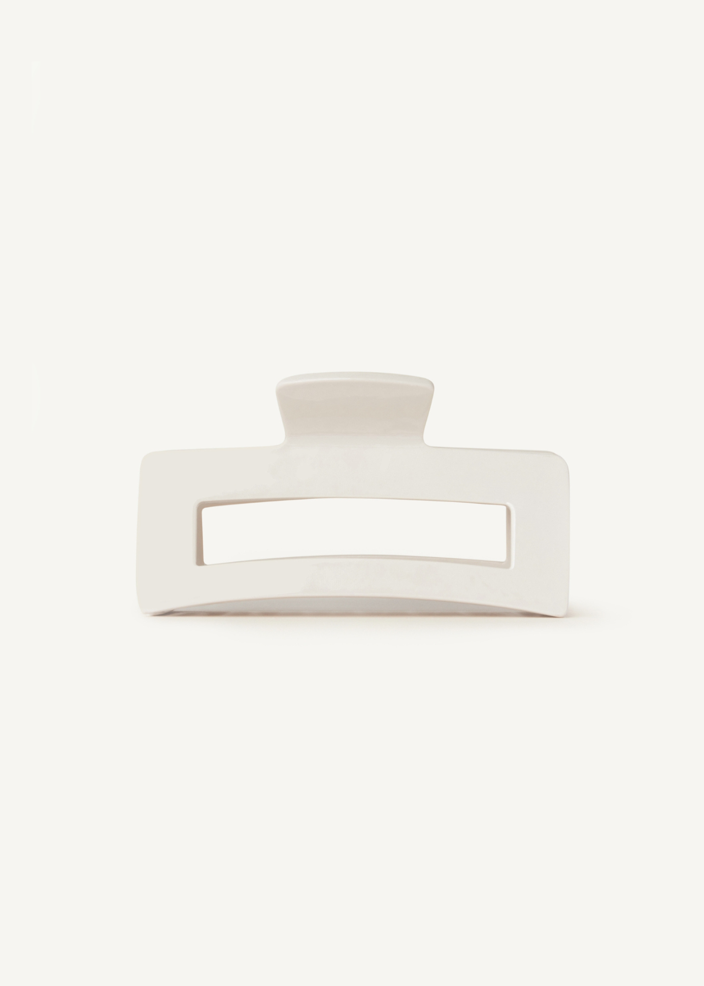 White hair clip on a white background