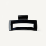 Black hair clip on a white background