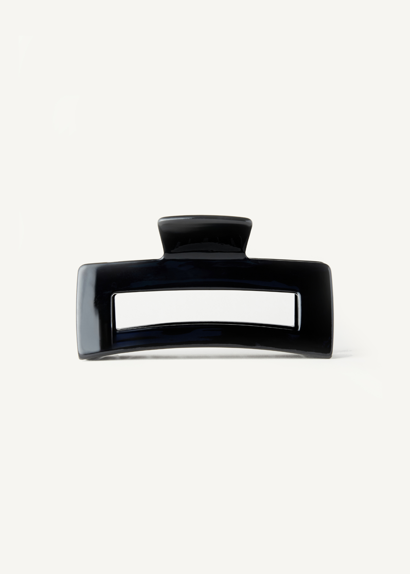 Black hair clip on a white background