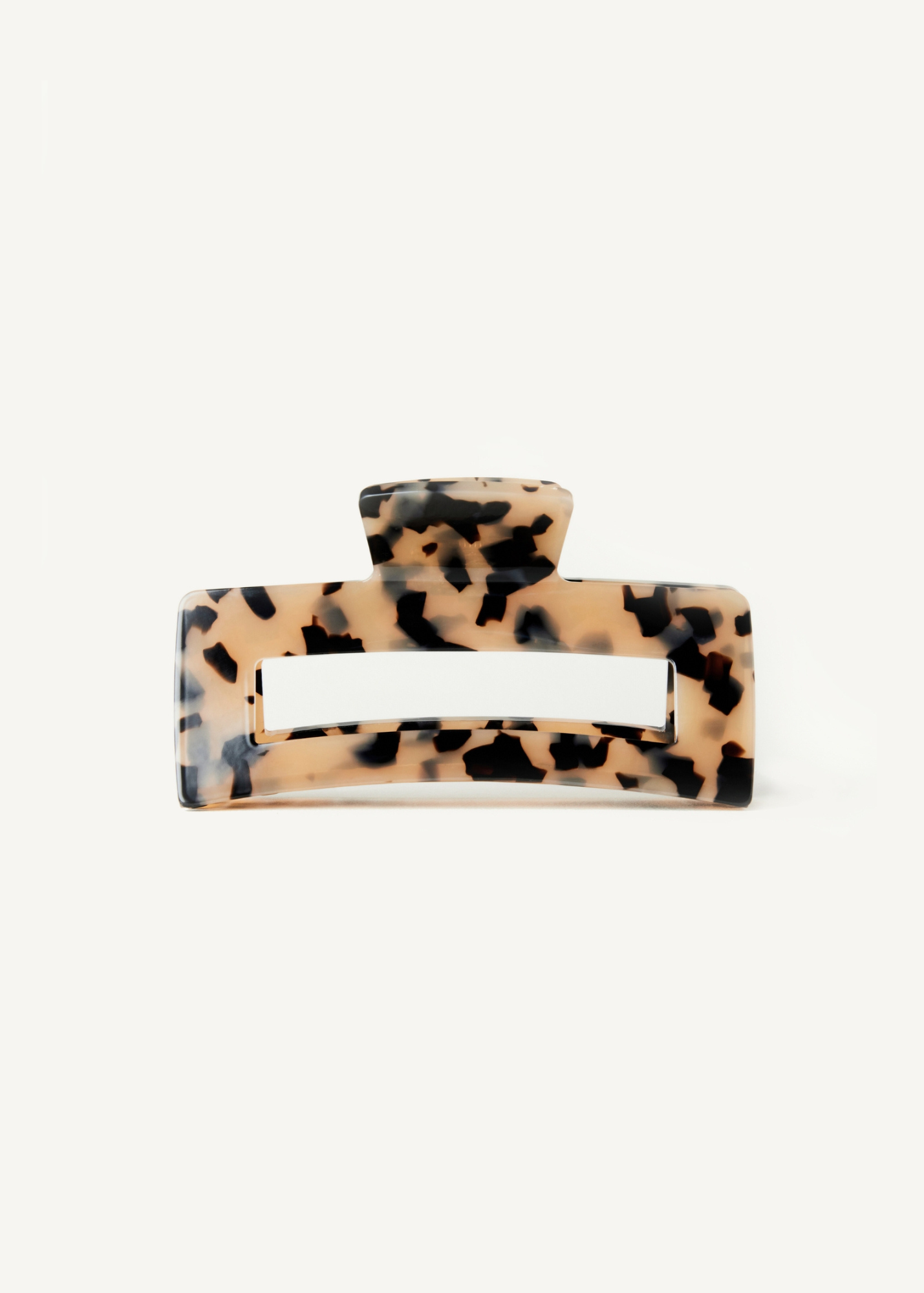 Tortoiseshell claw clip on a white background