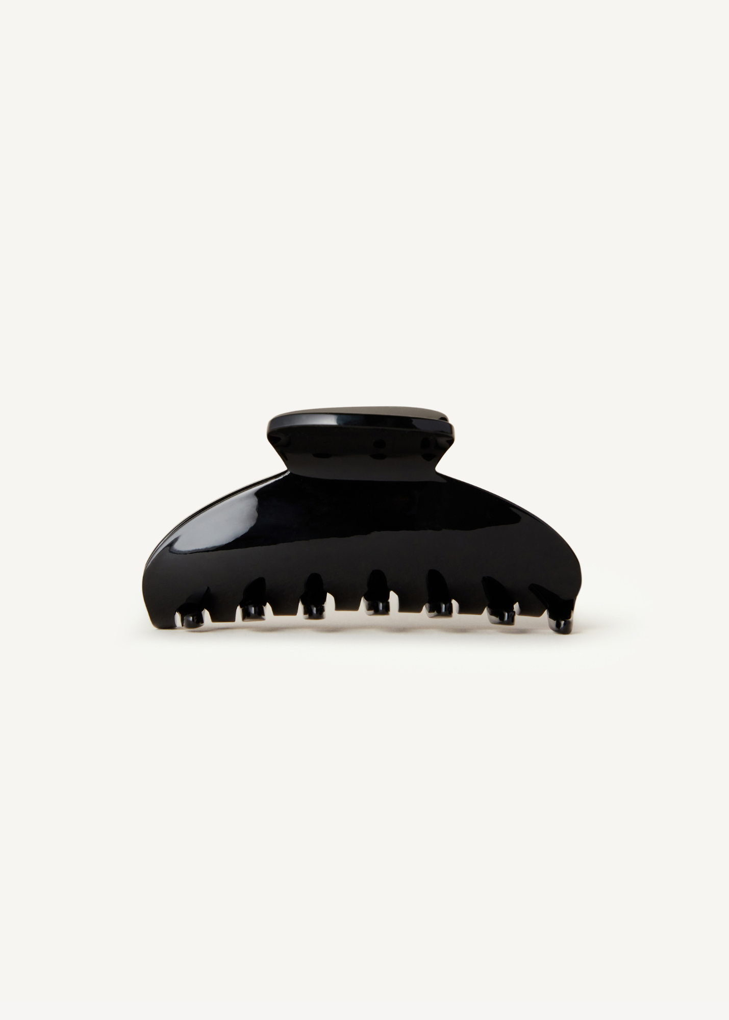 Black hair clip on a white background