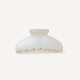 Pearl hair clip on a white background.