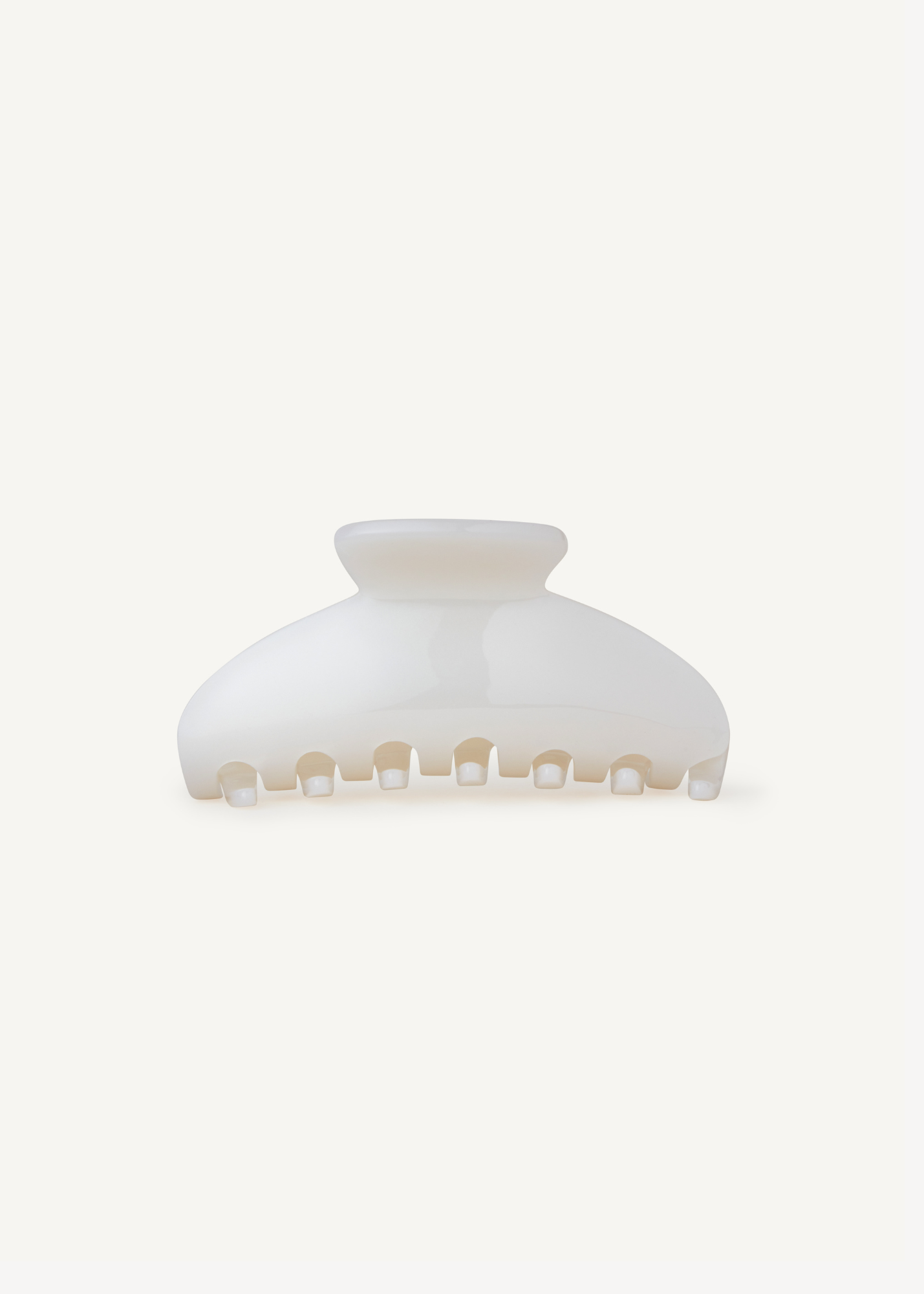 Pearl hair clip on a white background.