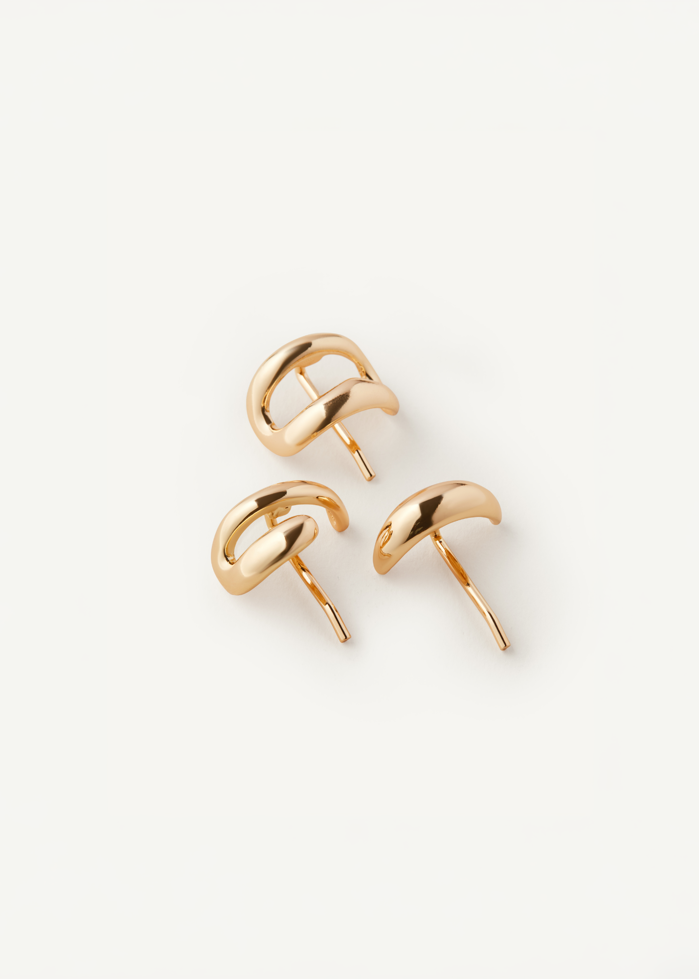 Set of 3 gold Hair Cuffs on a white background.
