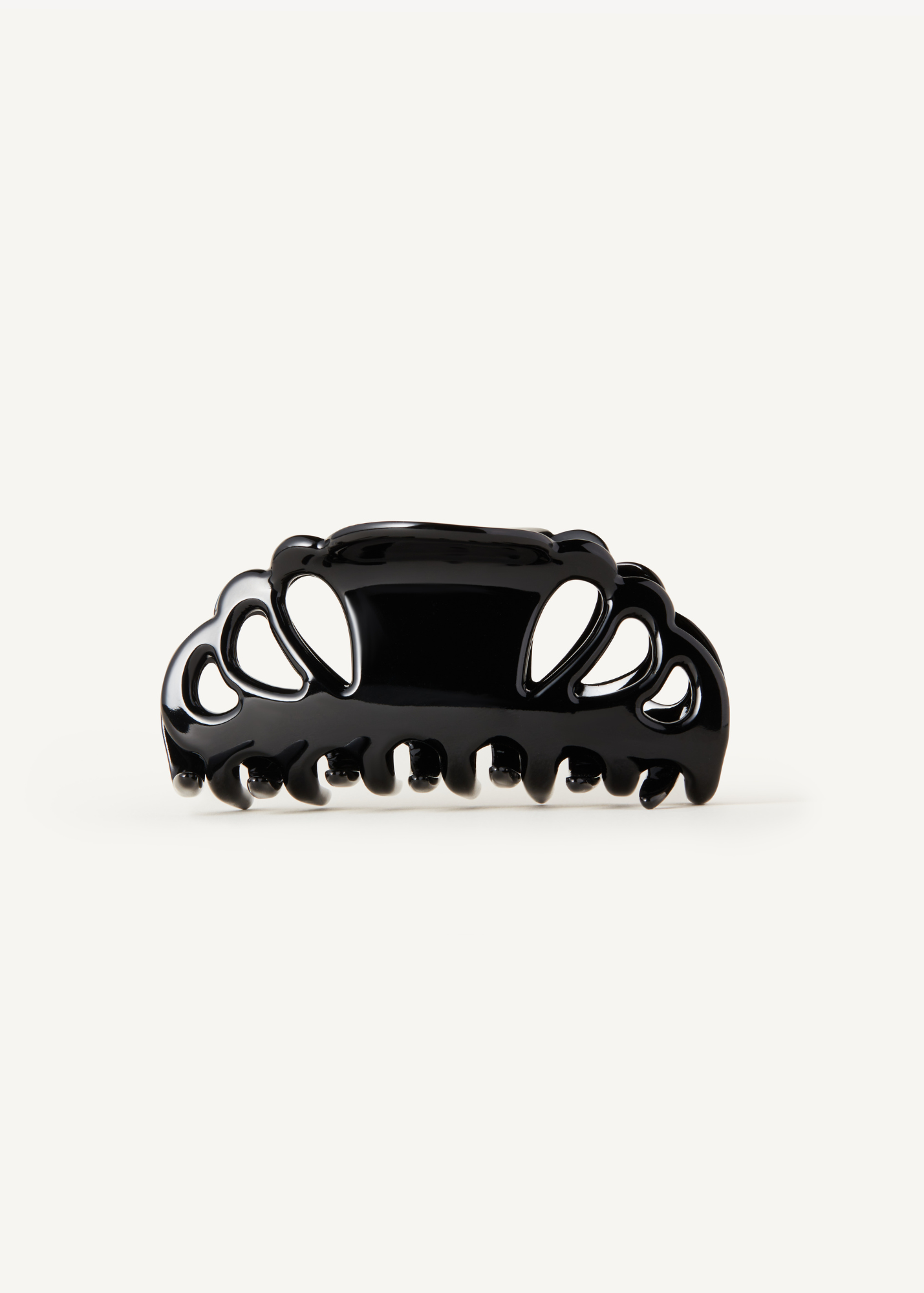 Black hair clip on a white background