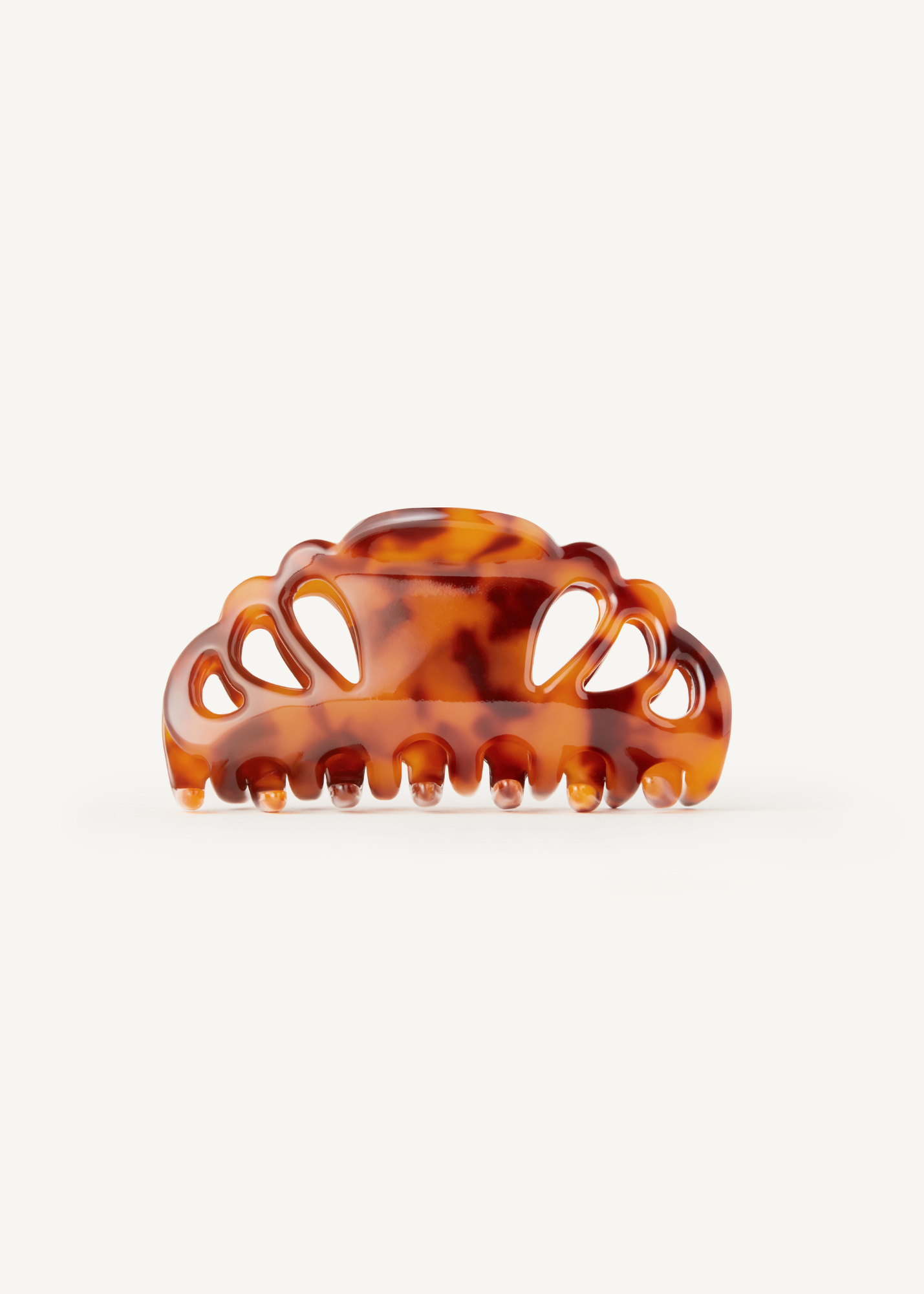 Tortoiseshell hair clip on a white background