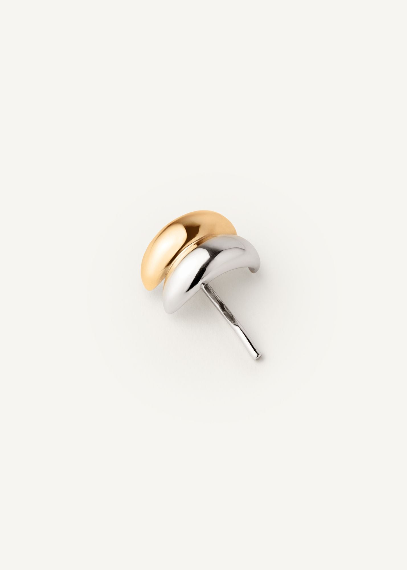The mixed metal hair cuff, a two-toned gold and silver cuff on a white background