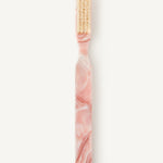 Pink marbled style hairbrush with beige coloured bristles on a white background