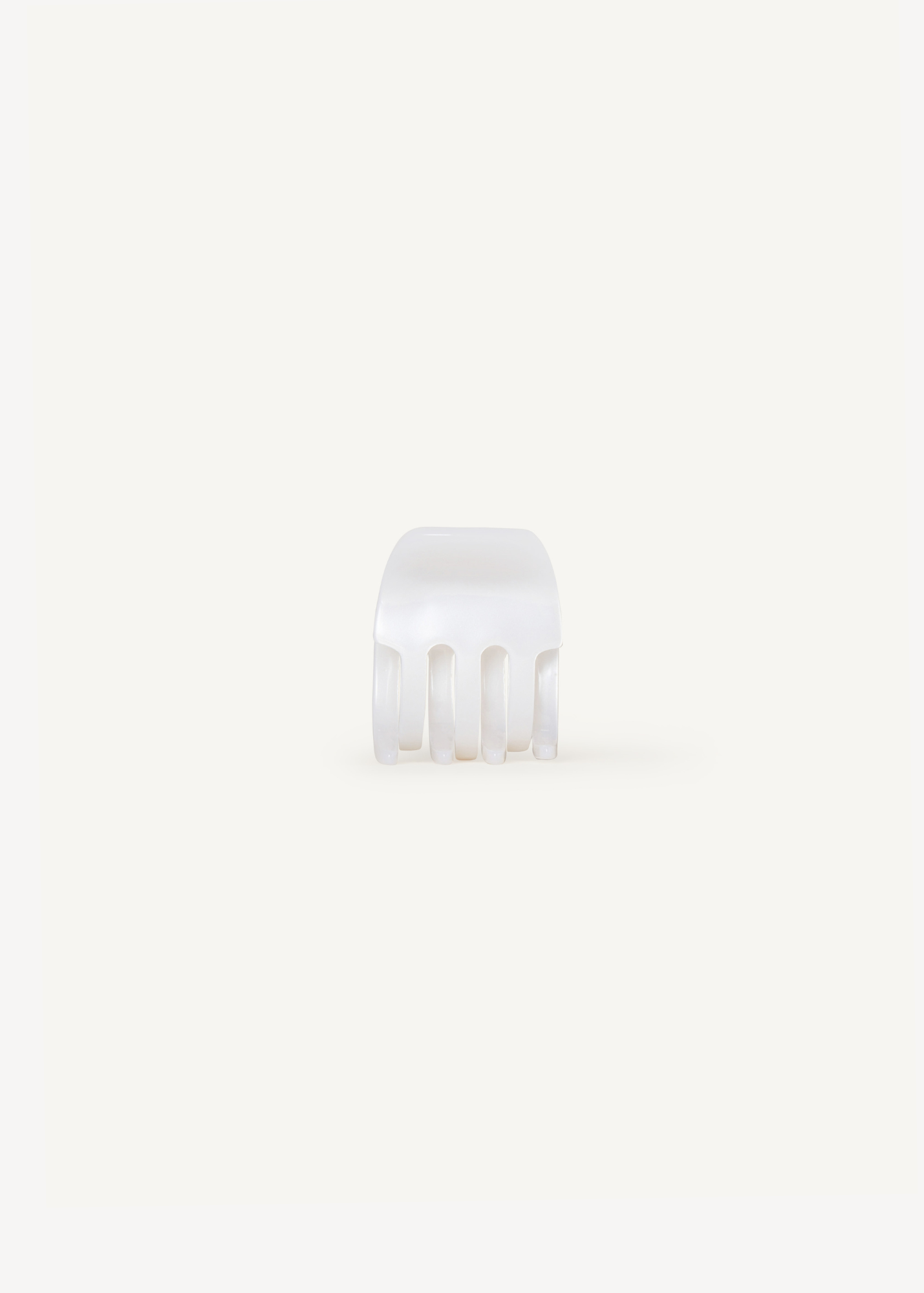 Small pearl claw clip on a white background.