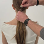 Woman with long brown hair, styled in a ponytail featuring the Mixed Metal Hair Cuff against a white background